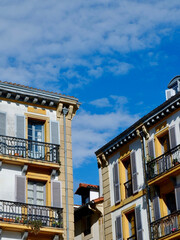 Obraz premium Colourful antique facades downtown in San Sebastian, Basque country, Spain. Vertical photo