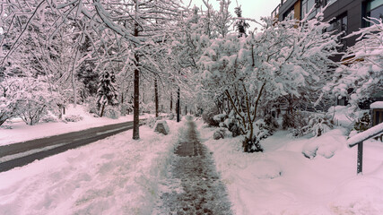 Canadian suburban street in winter after heavy snowfall.