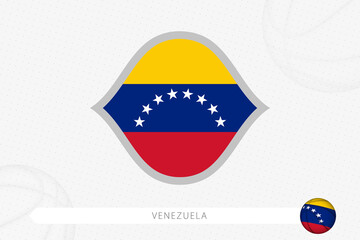 Venezuela flag for basketball competition on gray basketball background.
