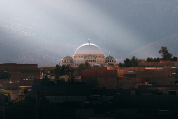 bousaada msila . high full view of bousaada town in msila algeria with mosques and building and beautiful lighting - obrazy, fototapety, plakaty