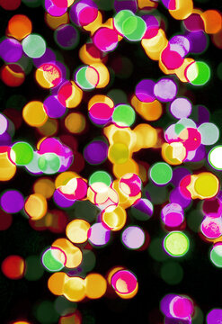Abstract image of a Christmas tree made of electric lights.