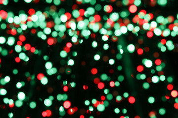 Holiday decorations from electric holiday lights at night.