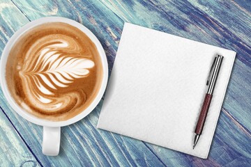 New year concet for review text on a napkin with a cup of coffee, end of year business concept