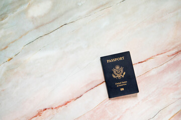 American Passport Book on Pink Marble Background, Travel