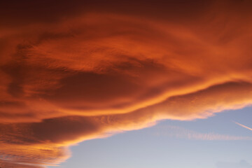 Fototapeta premium Sky light after sunset. orange background, blue