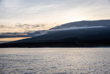 uninhabited islands of the Galapagos archipelago against the backdrop of the sea and blue sky 
