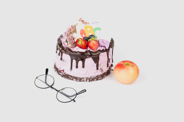 Beginning of the school year concept, festive cake with ABC, apple and glasses. Back to school. Hello school. Time to learn. Education. First September. 