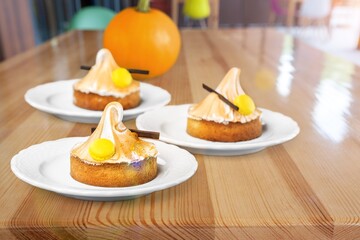Muffins with pumpkin. Delicious homemade dessert. Halloween treats. Vegetarian dish.