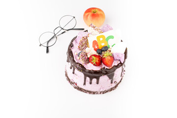 Beginning of the school year concept, festive cake with ABC, apple and glasses. Back to school. Hello school. Time to learn. Education. First September. 