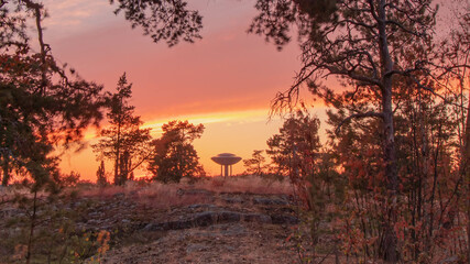 Sunset and a building structure resembling UfO. Photo taken in Espoo in southern Finladi.