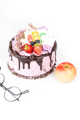 Beginning of the school year concept, festive cake with ABC, apple and glasses. Back to school. Hello school. Time to learn. Education. First September. 