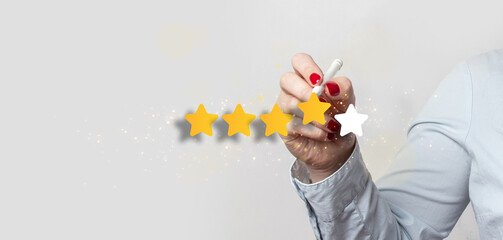 Close up on customer woman hand pressing gold star rating feedback icon for service business...