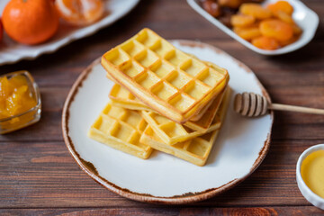 Belgian waffles for breakfast with honey