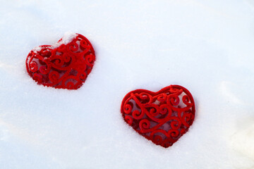 Fototapeta premium two red hearts on a white background