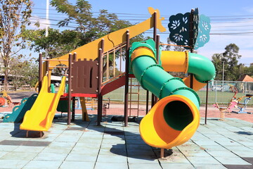 Kids Corner in a public park, Colorful tunnel and slider