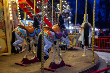 beautiful children's carousel bright with a horse