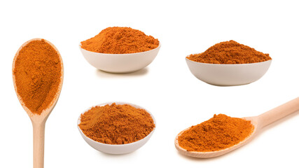 Paprica on wooden spoon isolated.