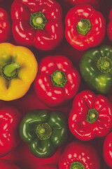Fresh red, green, yellow bell pepper background.