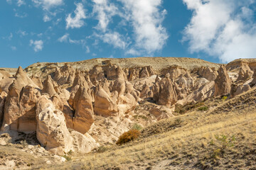 Fototapeta premium Devrent Valley or Dream Valley and fairy chimneys in Cappadocia, Turkey. Devrent Valley or Dream Valley is one of the most popular touristic places in Cappadocia.