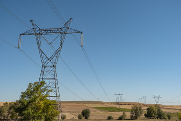 High voltage electricity tower or post. Electricity poles and electric power transmission lines....