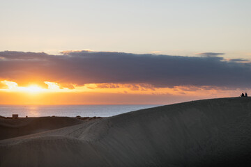 Fototapeta na wymiar Sunrise in the dunes of Maspalomas, Gran Canaria, Spain