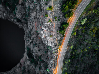 Long exposure shot of moving car next to the Red lake in April at Imotski, Dalmatia, Croatia