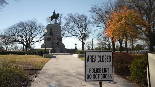 Washington, DC, USA - 12 26 2021: General William Tecumseh Sherman Statue in Presidents Park next to the White House, area closed, police line, do not cross.