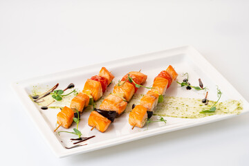 grilled salmon on a skewer with vegetables. Grilled seafood