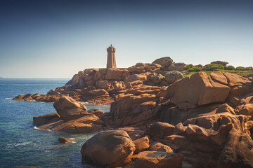 Ploumanach lighthouse in pink granite coast, Brittany, France.