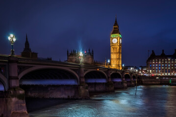 Fototapeta na wymiar Panorama Westminster Bridge, Big Ben Tower with clock, evening, lights, river Thames, district of London, UK.