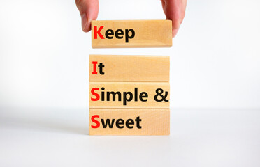KISS keep it simple and sweet symbol. Concept words KISS keep it simple and sweet wooden blocks....