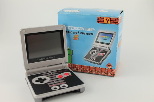 Game boy advanced Sp, classic NES edition with box, isolated on a white background.  Lancashire, UK, 07-07-2020
