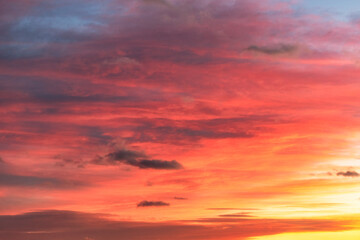 Naklejka na ściany i meble Fiery red sky. Sky with many shades of red at sunset.