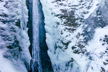 Waterfall Siklawica at winter time.Tatra Mountains in Poland, near Zakopane, Europe.