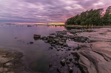 Sunset and rocky coast in southern Finland on the Baltic Sea