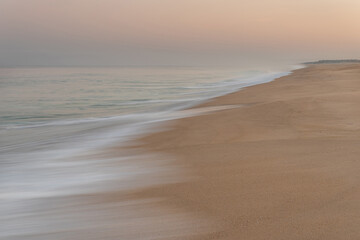 Suggestive movement of the waves at sunrise on the Alentejo Coast