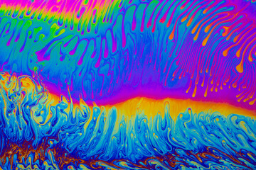 Psychedelic multicolored background abstract. Rainbow colors. patterns background. Photo macro shot...