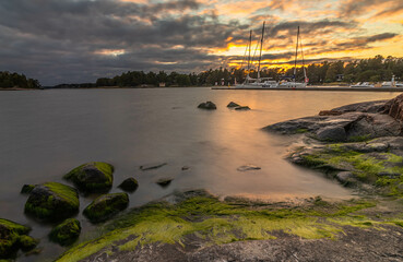 Sunset and Haukilahden venesatama port in southern Finland.
