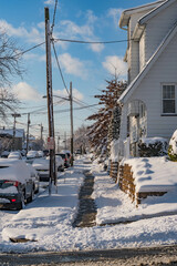 Residential area covered with snow, beatiful sunny day after a snow storm.