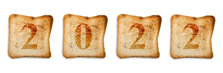 2022 written on toasted slices of bread, food new year concept