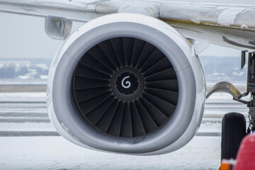 Aircraft jet engine with traces of operation and carbon deposits from fuel, turbine blades, airliner engine