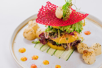 Salad with Australian scallops on a white background