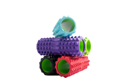 Several foam rollers for self-massage of muscles after training. Equipment for MFR. Rollers for physiotherapy isolated on white background