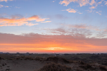 early in the morning to watch the dawn in the dunes, pink dawn, the play of light, the world wakes up
