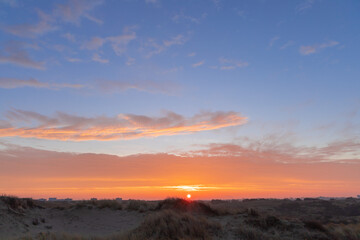 early in the morning to watch the dawn in the dunes, pink dawn, the play of light, the world wakes up