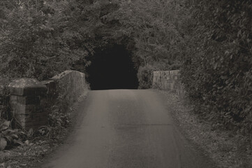 country road, bridge to the black hole, England