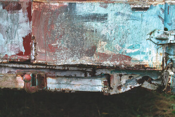 grunge pattern of metal chaotically painted car