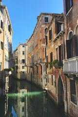 Obraz na płótnie Canvas A photo of Venice canal view on a sunny day.