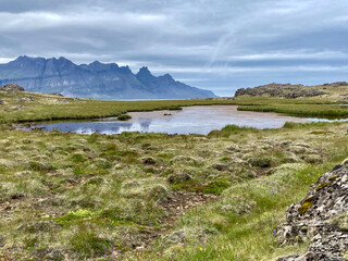 Mystic Landscape with a Lake and Mountains in Iceland