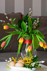 Happy Easter. Yellow-red tulips in a vase. Czerwono-żółte tulipany w wazonie, Easter floral...